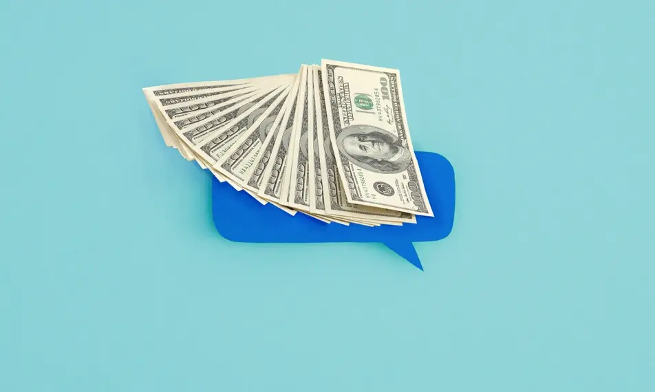 A blue background with an abstract illustration of a blue speech bubble and hundred dollar bills fanned out on top