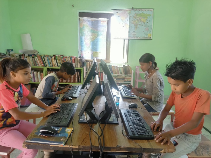 Students in Dehradun learning computer skills