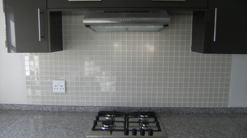 Kitchen with oven , gas hob and extractor fan