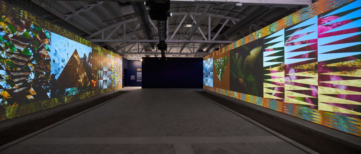 Exhibition view of ICA SF with two walls of colorful projections