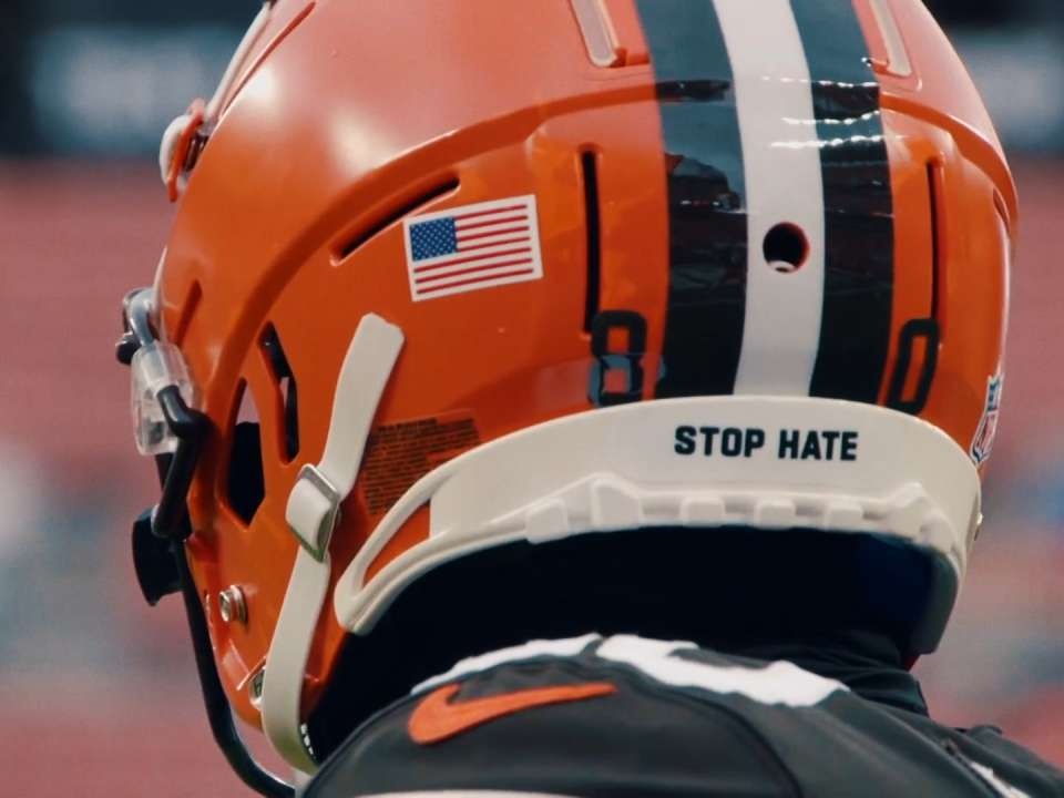 Why do NFL helmets have 'Stop Hate' written on them?