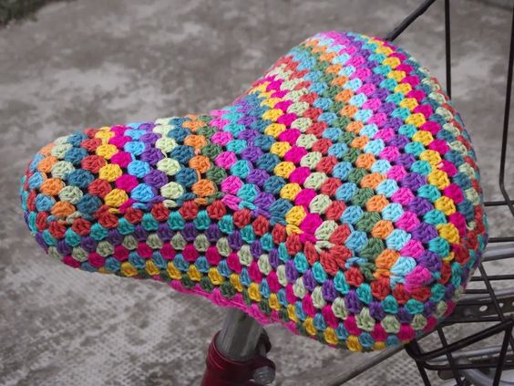 colourful crocheted saddle cover