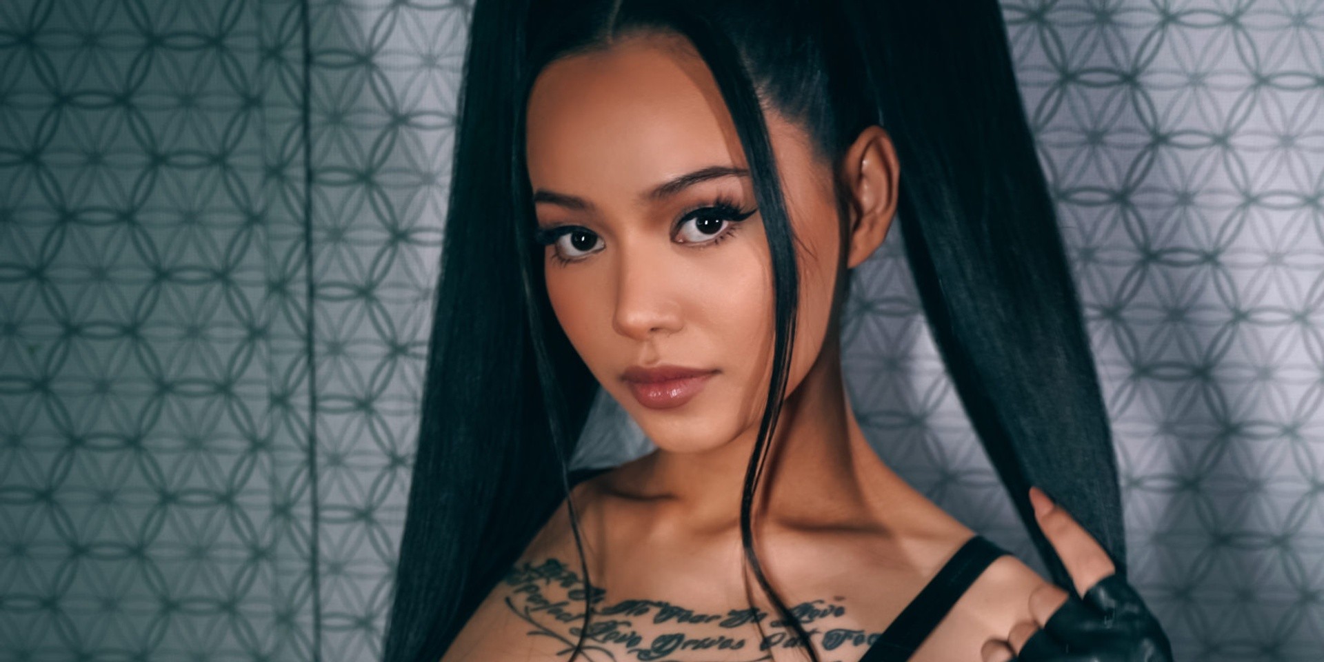 TikTok star Bella Poarch signs to Warner Music, unveils music video for debut single – watch