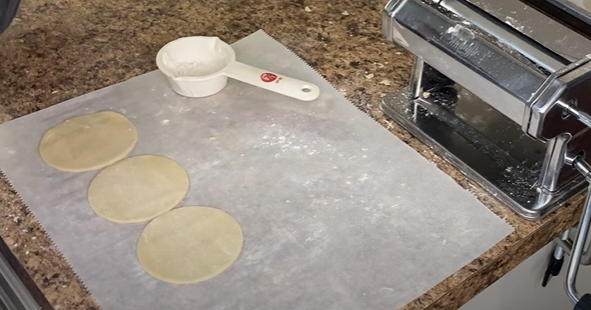 Discs of dough on the kitchen table