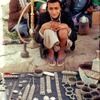 A Jewish seller selling jewelry in the Sa'adah suq, Sa'adah, Yemen 1988. Photo courtesy Naftali Hilger