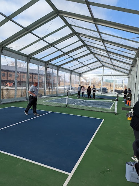 covered outdoor pickleball courts        
        <figure class=