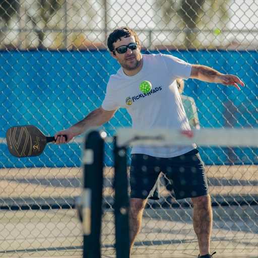 Person playing pickleball