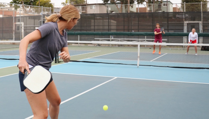 Person playing pickleball