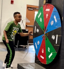 Student spinning the House wheel