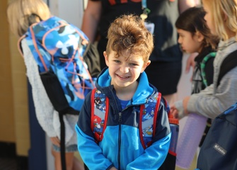 Students arrive for the first day of school