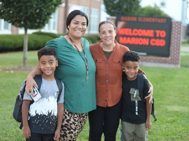 Students arrive for the first day of school