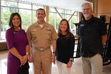 Superintendent Michelle Kuss-Cybula, Capt. Nathan Gammache, Mrs. Gammache, and Assistant Superintendent Dwight Lundstrom