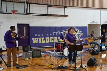 Eric Christiansen Band performs at the staff kickoff in OHHS' gym