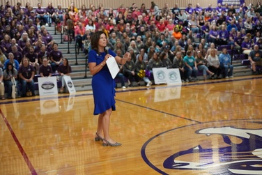 superintendent Dr. Michelle Kuss-Cybula speaks to staff in the gym