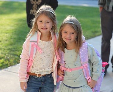 Students arrive on the first day of school