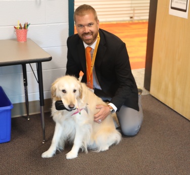 Principal meets service dog 