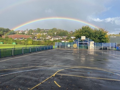 Basket ball court and rainbow