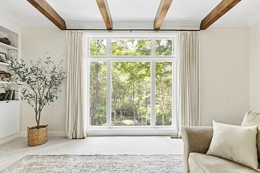 Interior living room with white awning and picture Infinity windows.