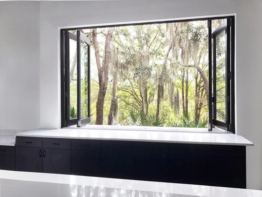 Interior of a home featuring Marvin Coastline hurricane rated bifold doors