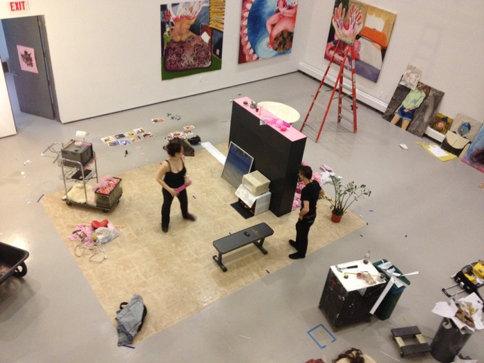 An aerial photo of a gallery space during the installation of work by the undergraduate class of 2014.