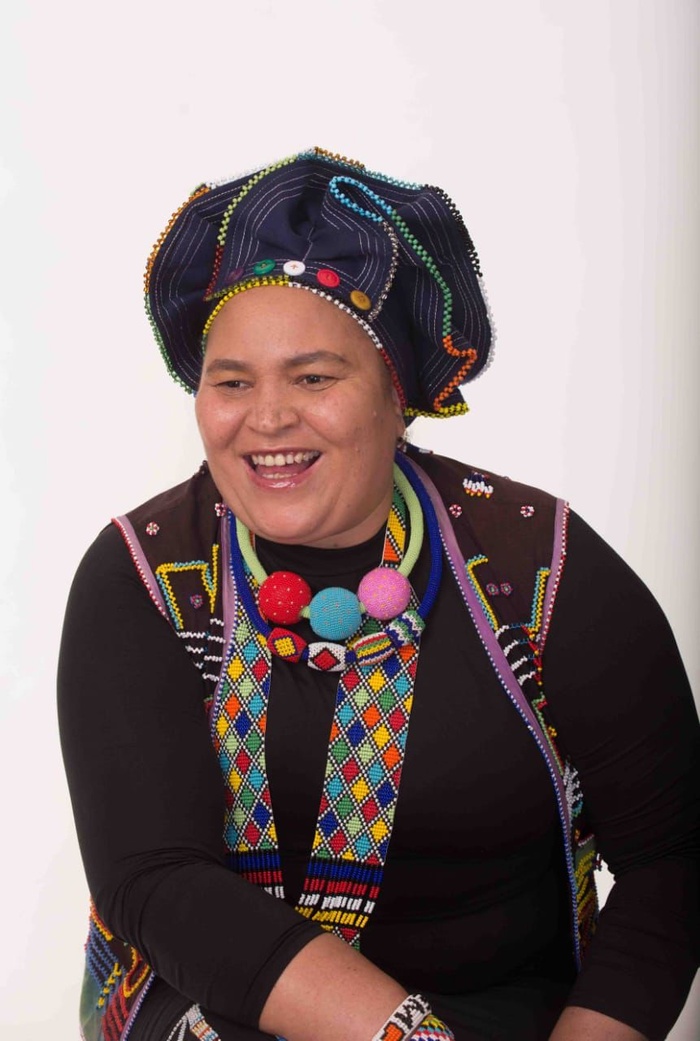 Three-quarter portrait photograph of Hlengiwe Dube.