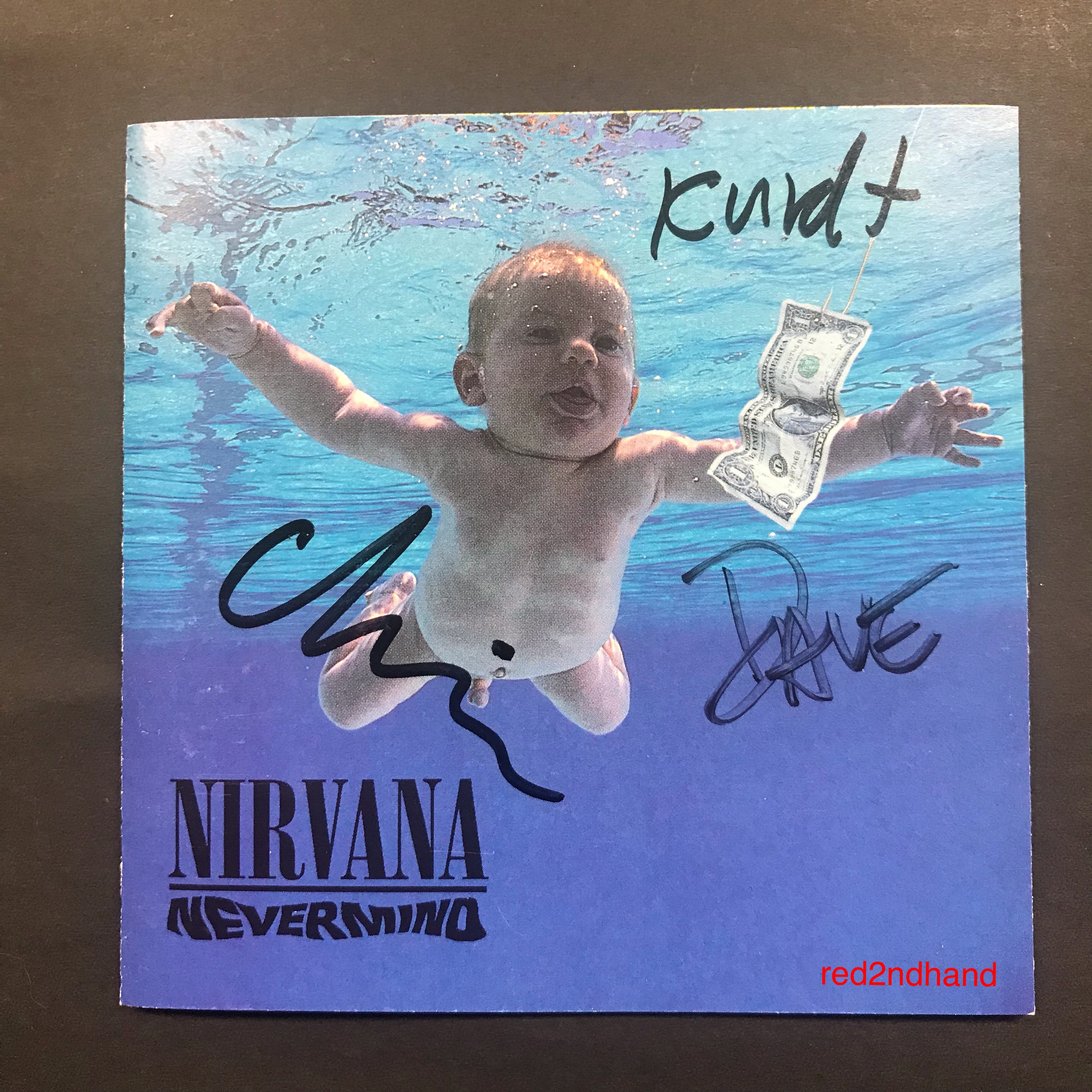 Nirvana Nevermind CD. Signed by Kurt Cobain, Chris Novoselic