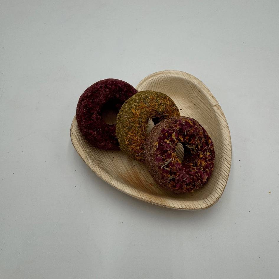 Three Donut Treats for Bunnies in Palm Leaf Bowl