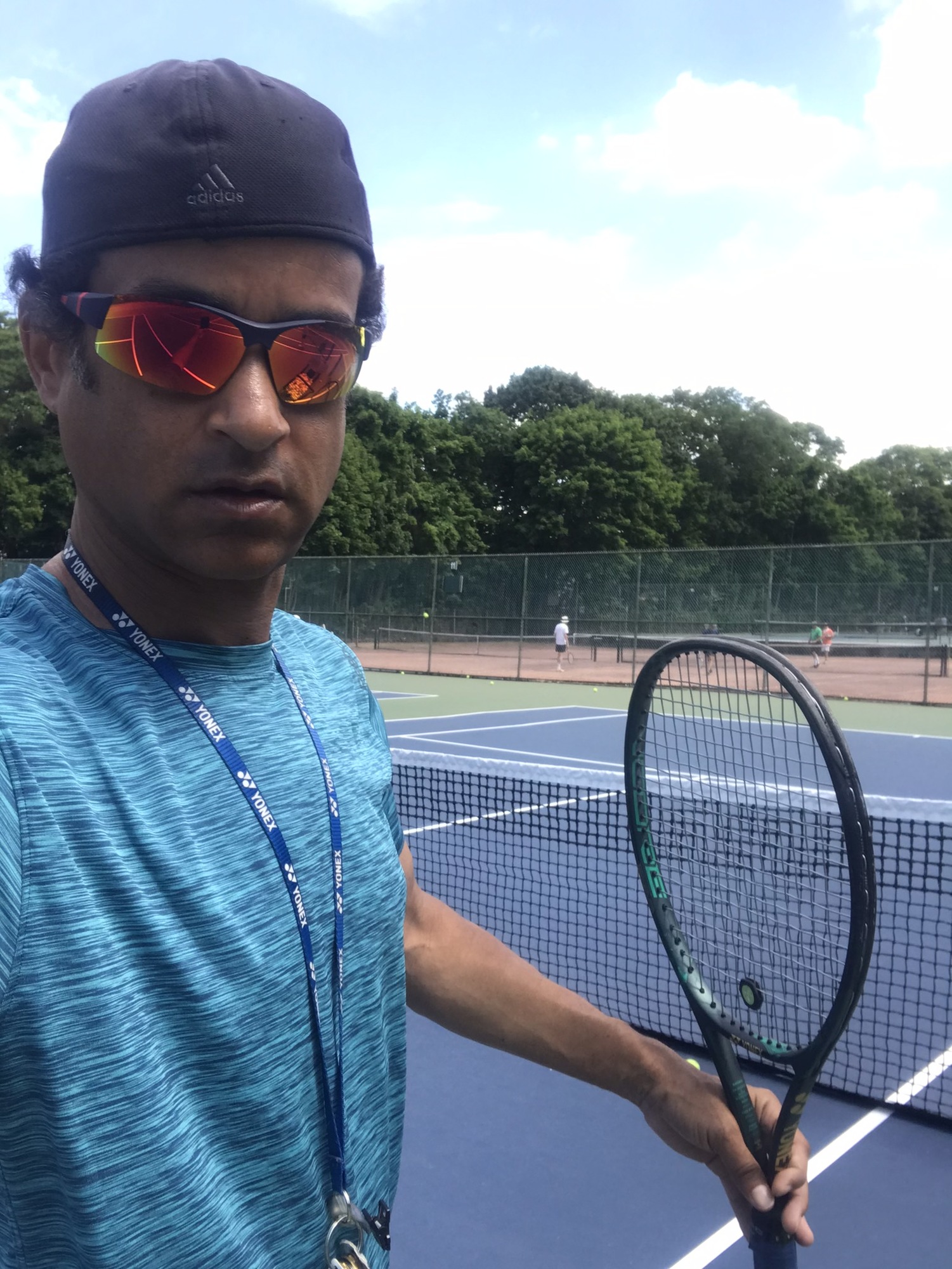 Justin S. teaches tennis lessons in Rego Park, NY