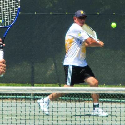 Chuck V. teaches tennis lessons in Highland, MI