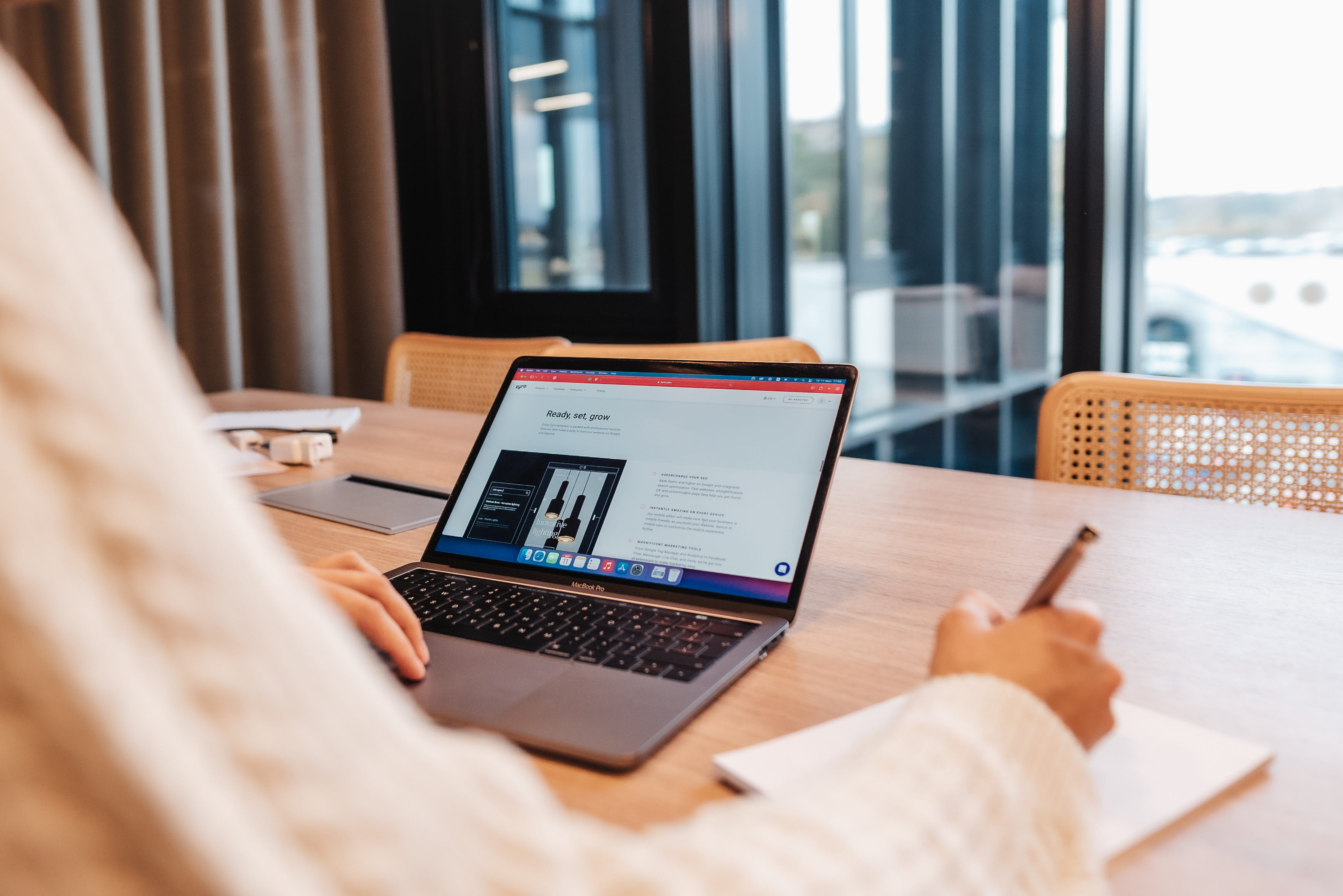 person looking at there online business on a laptop