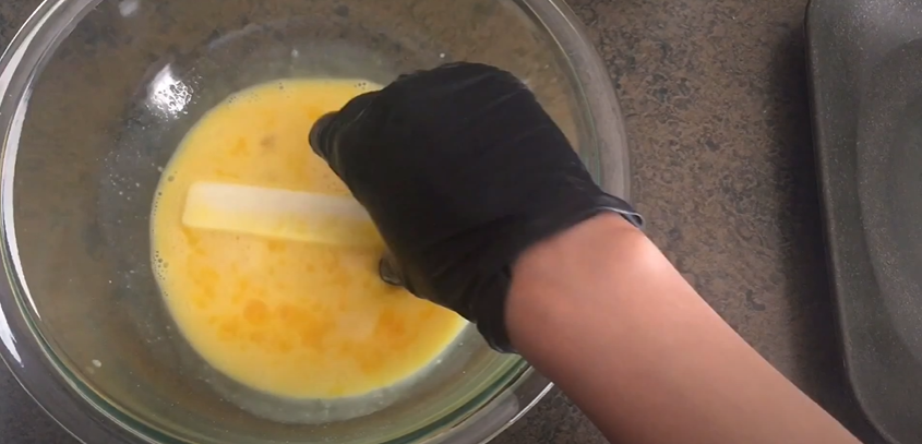 Mozzarella stick in the egg mixture