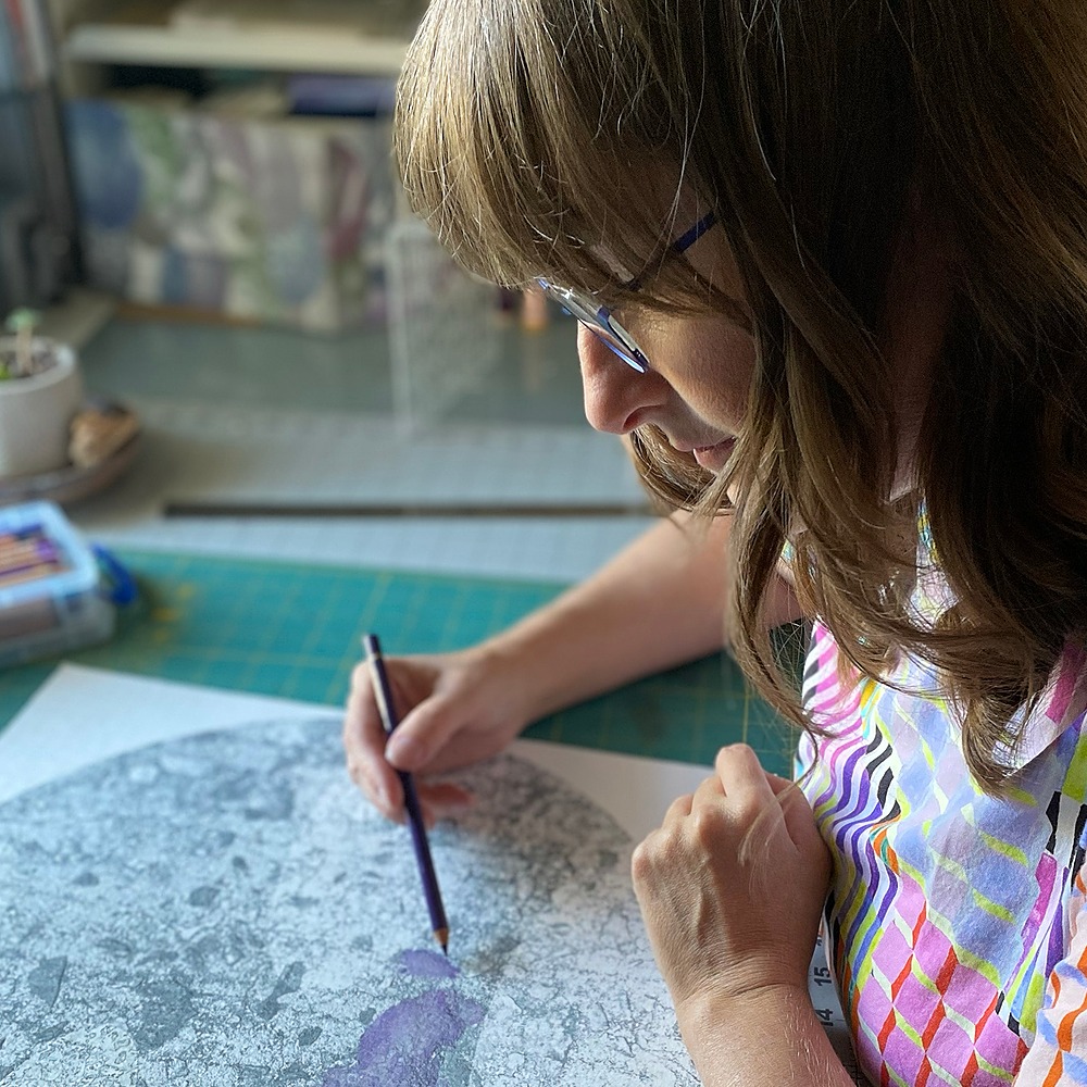 Vanessa Wallace at work using coloured pencil