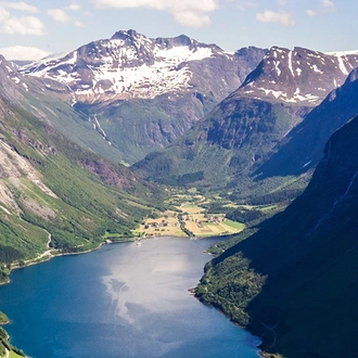 A view of Geiranger Fjord in Norway, one of the world's largest, on a bright sunny day.