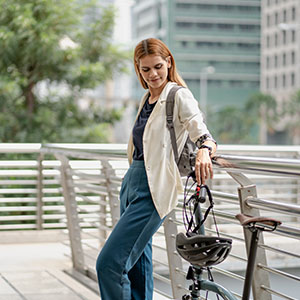 commuter lady beside the bike