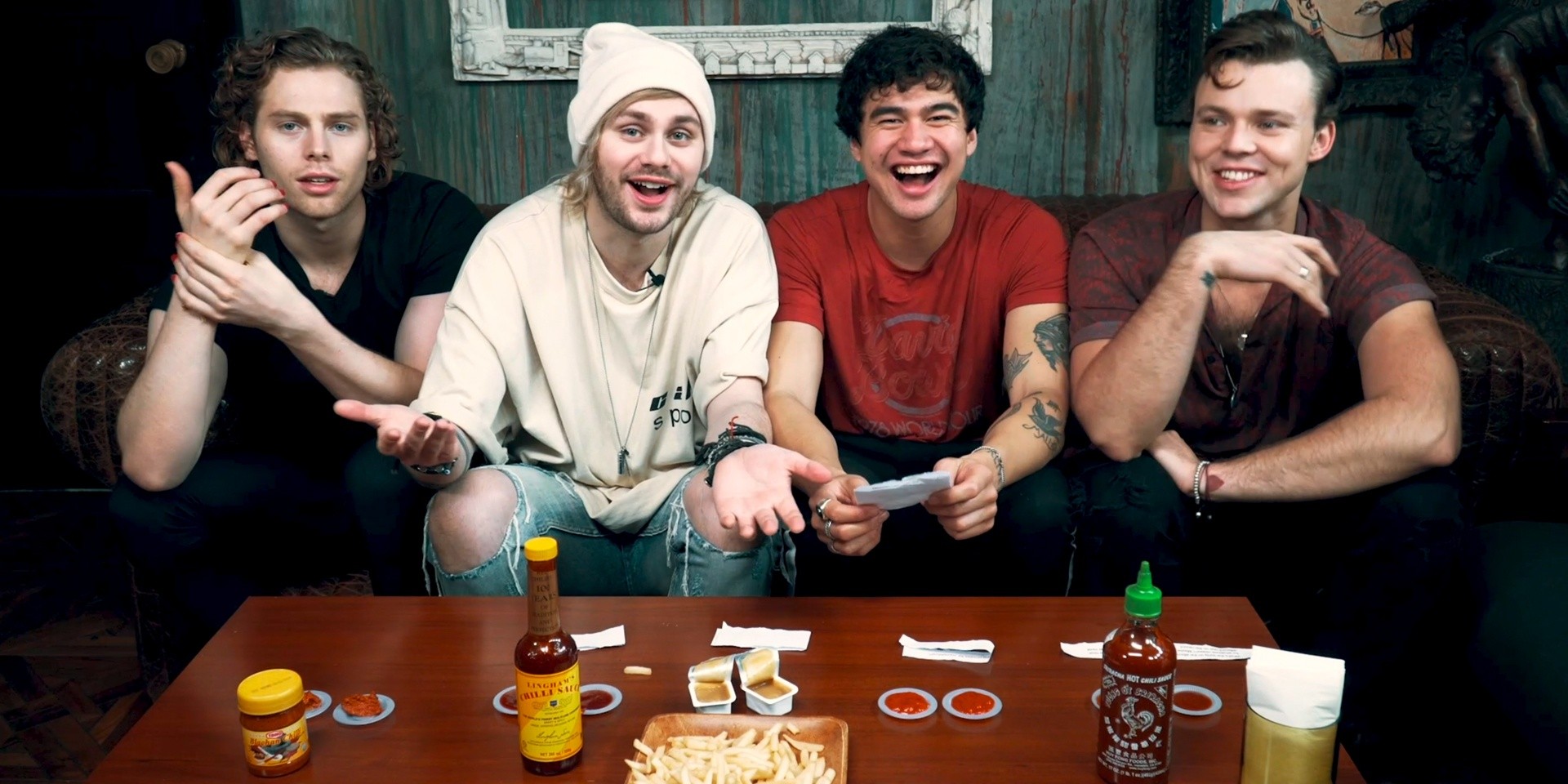 5 Seconds of Summer sample five Singaporean sauces and answer questions about Youngblood – watch